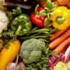 Fresh vegetables including cauliflower, peppers, broccoli, and carrots — all good candidates for storing without refrigeration