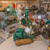 Room with mechanical equipment and engines mounted on stands - Marine Diesel Maintenance Class