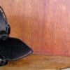 Black fan with exposed blades - best fans for living on a boat in hot weather