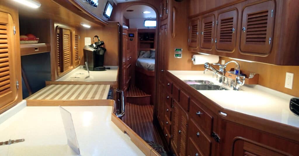 large boat galley with dark cabinets - boat galley strap dangers and what you need to know