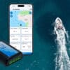 Power boat with inset of Roam Device and phone with app open