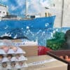 Eggs packed in cellophane - buying from the ship in the Tuamotus