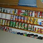 Got a shallow little compartment that's not used for much? Build a can pantry that's easy to access and easy to see immediately what you have!