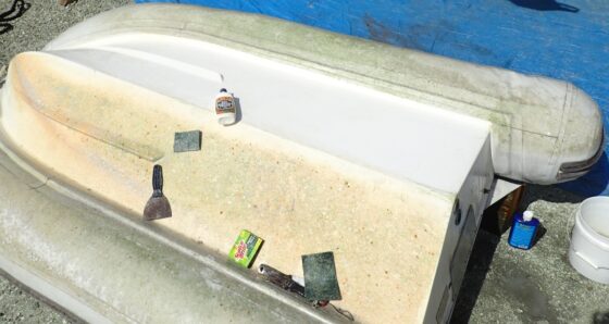 Dinghy bottom with cleaning products