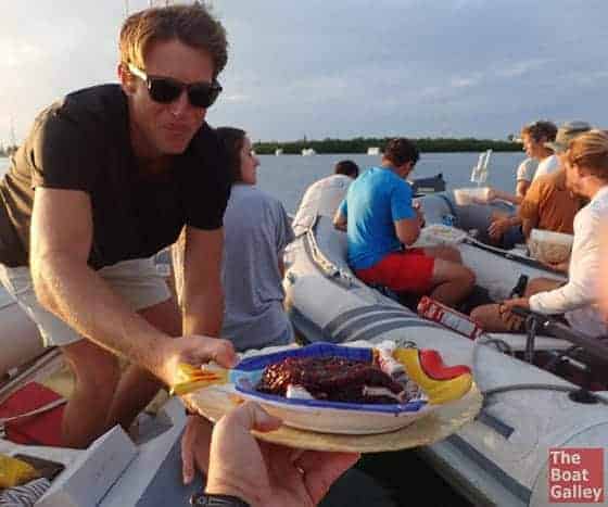 Passing food at a dinghy drift