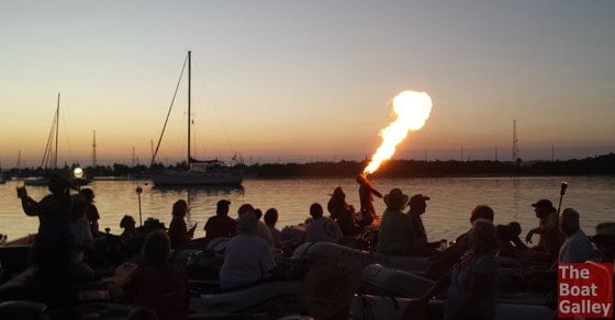 A fireeater performing at a dinghy drift