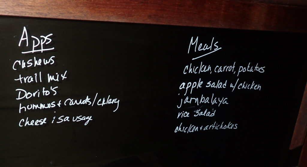 meal ideas on black plastic with white liquid chalk