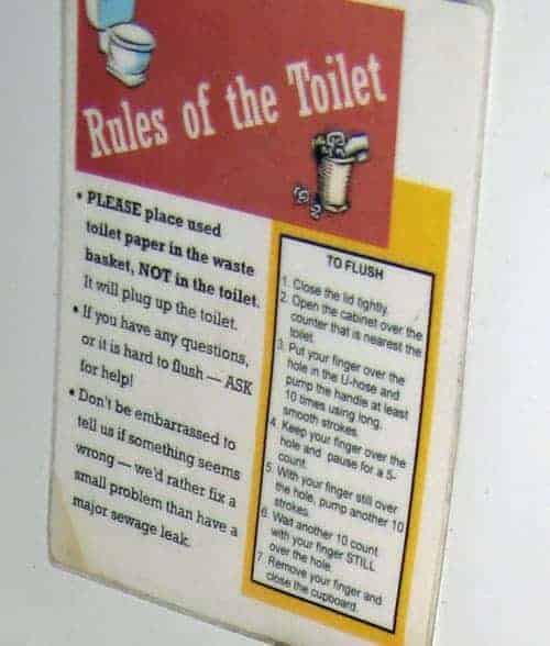 Sign over toilet on a boat