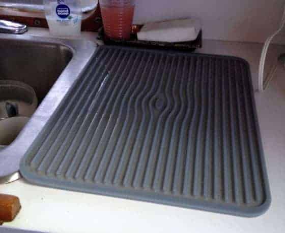 Another great idea for drying dishes . . . AND a place to set hot pans where they won't slip and slide, all rolled into one. Better yet, it's not expensive!