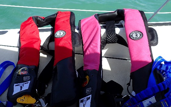 Setting Up New PFDs/Offshore Life Jackets: Good PFDs and tethers are expensive high tech gear. Here's what we chose and tips on setting it all up.