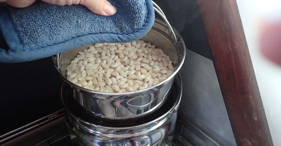 Putting smaller pan inside larger one of the thermal cooker