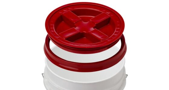 Gamma Seal lid on a white 5-gallon bucket with red screw-top lid removed