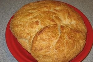 No-Knead Bread is simple to make and a treat to eat. Basic recipe, along with some tips for making it on a boat and ways to hurry it up.