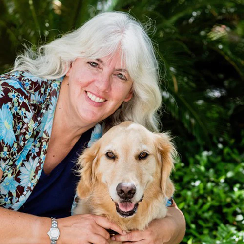 Pamela Douglas and her golden retriever, Honey
